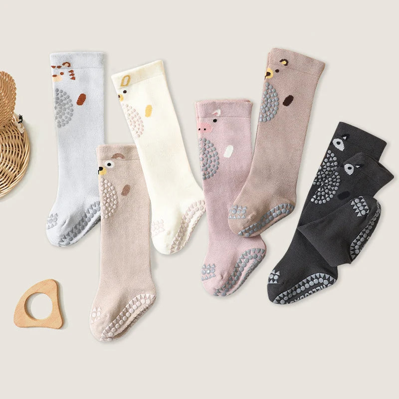 جوارب أرضية مانعة للانزلاق للأطفال تصل إلى الركبة